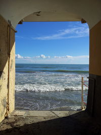 Scenic view of sea against sky seen from corridor