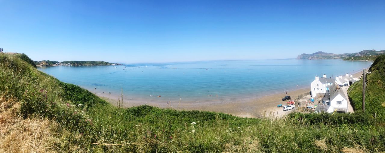 PANORAMIC VIEW OF SEA AGAINST CLEAR SKY