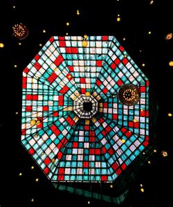 Low angle view of illuminated chandelier