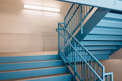 Low angle view of spiral staircase in building