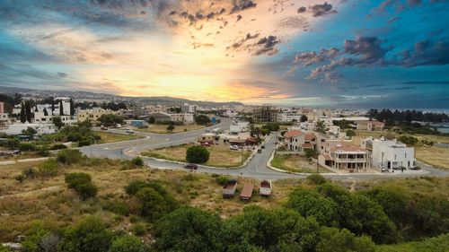 High angle view of townscape against sky at sunset