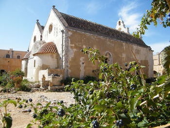 Low angle view of old building against sky