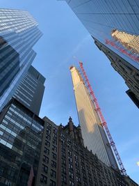 Low angle view of modern buildings against sky