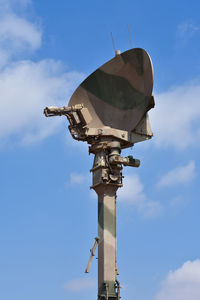 Low angle view of street light against sky