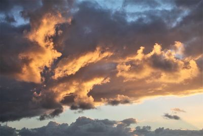 Low angle view of clouds in sky during sunset