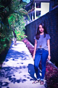 Full length portrait of young woman