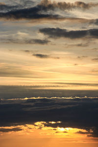 Scenic view of dramatic sky during sunset