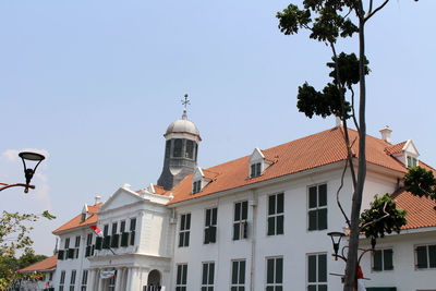 Low angle view of buildings against sky