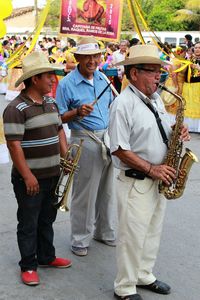 Group of people playing guitar