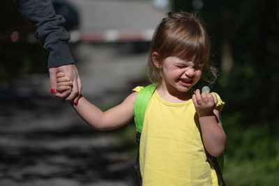 Cute girl standing outdoors