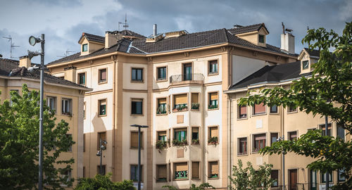 Low angle view of residential building against sky