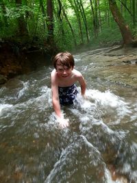 Portrait of boy in water