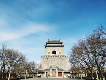 Low angle view of built structure against blue sky