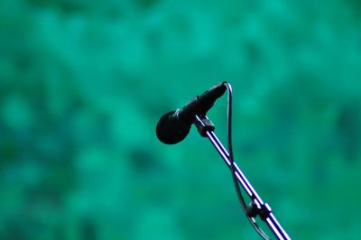 Close-up of microphone on stand outdoors