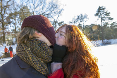 Woman wearing mask in winter