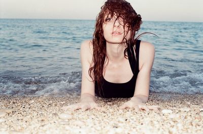 Woman wearing sunglasses at beach