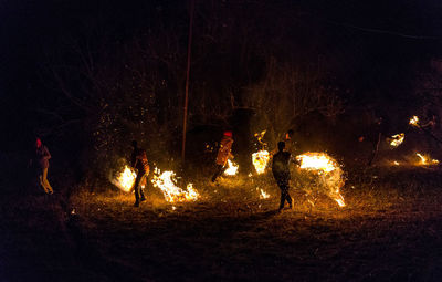 Group of people in the dark