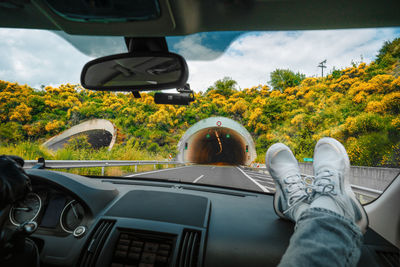 Low section of man in car