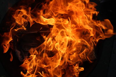 Close-up of fire in black background