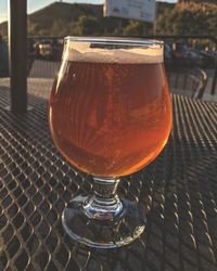 Close-up of beer glass on table