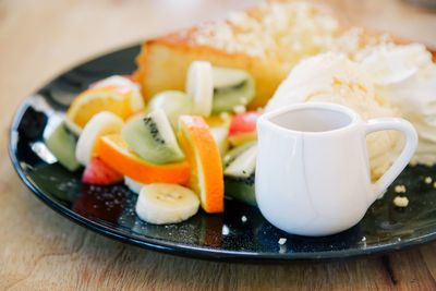 Close-up of food served on table