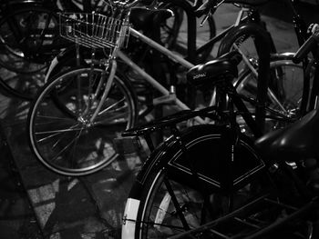 Bicycles parked on street at night