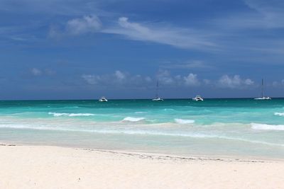 Scenic view of beach against sky