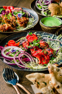 High angle view of food served on table