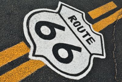 Close-up of arrow symbol on road
