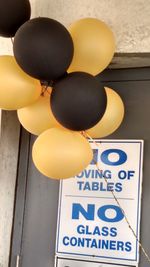 Low angle view of balloons hanging on ceiling