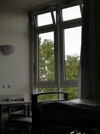 View of table through window of building