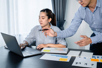 Business colleagues working at office