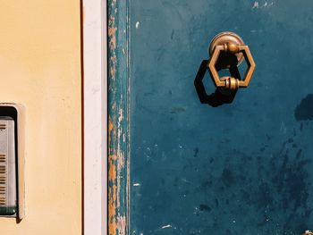 Door knob on a blue wooden door
