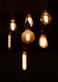 Low angle view of illuminated light bulb