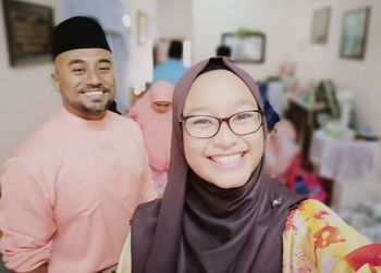 Portrait of a smiling young couple
