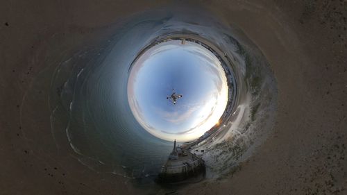 High angle view of airplane over sea