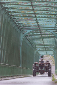 Rear view of tractor on bridge