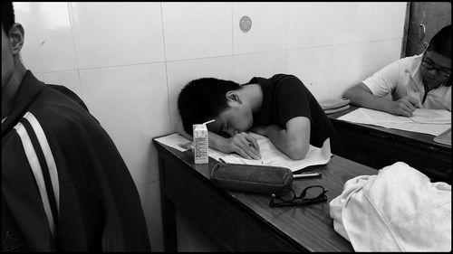 Man sleeping on book