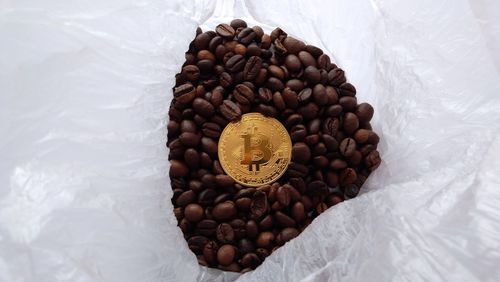 High angle view of coffee beans in container