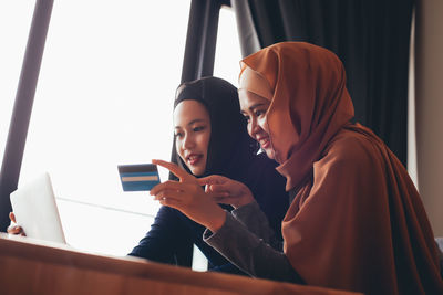 Young woman using mobile phone