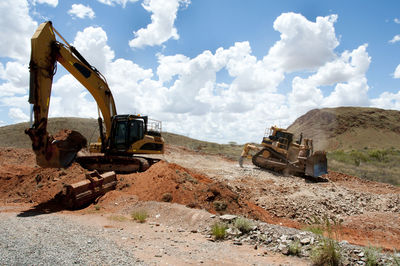 Construction site on field against sky