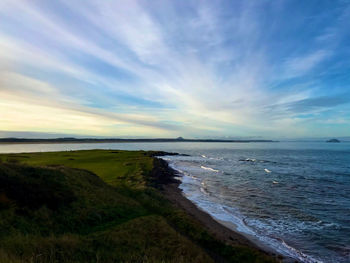 Scenic view of sea against sky during sunset
