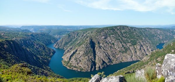 Scenic view of mountains against sky