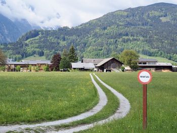 Scenic view of landscape and mountains against sky