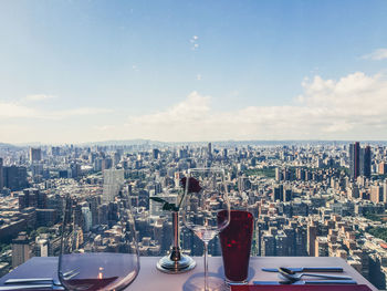 Panoramic view of city and buildings against sky