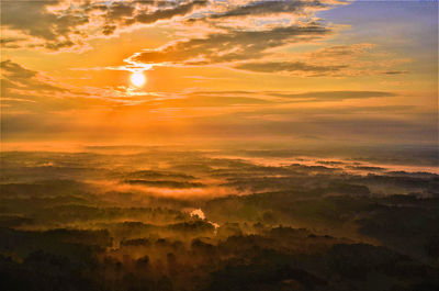 Scenic view of dramatic sky during sunset