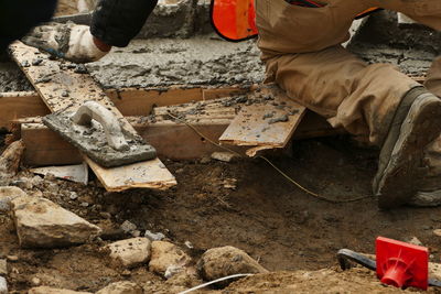 Low section of man working at construction site