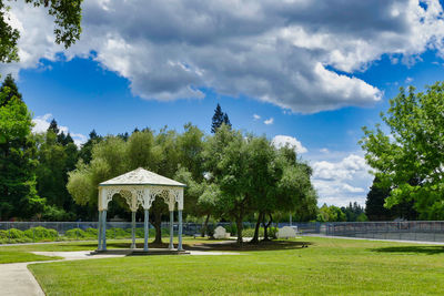 Gazebo in park against sky