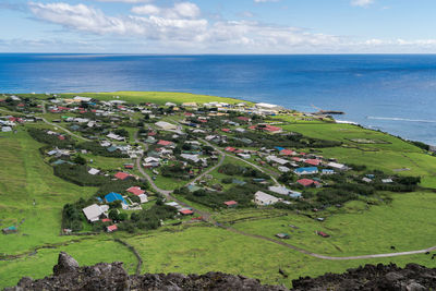 High angle view of plants and sea against sky