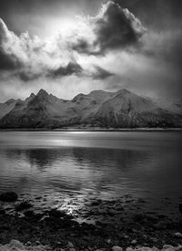 Scenic view of sea against cloudy sky